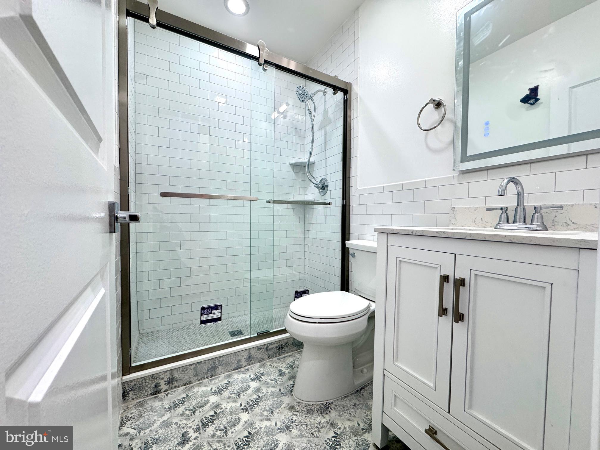 781 South 3rd Street, Unit 3 Philadelphia, PA 19147 - Photo 17 of 17 a bathroom with a sink toilet and shower