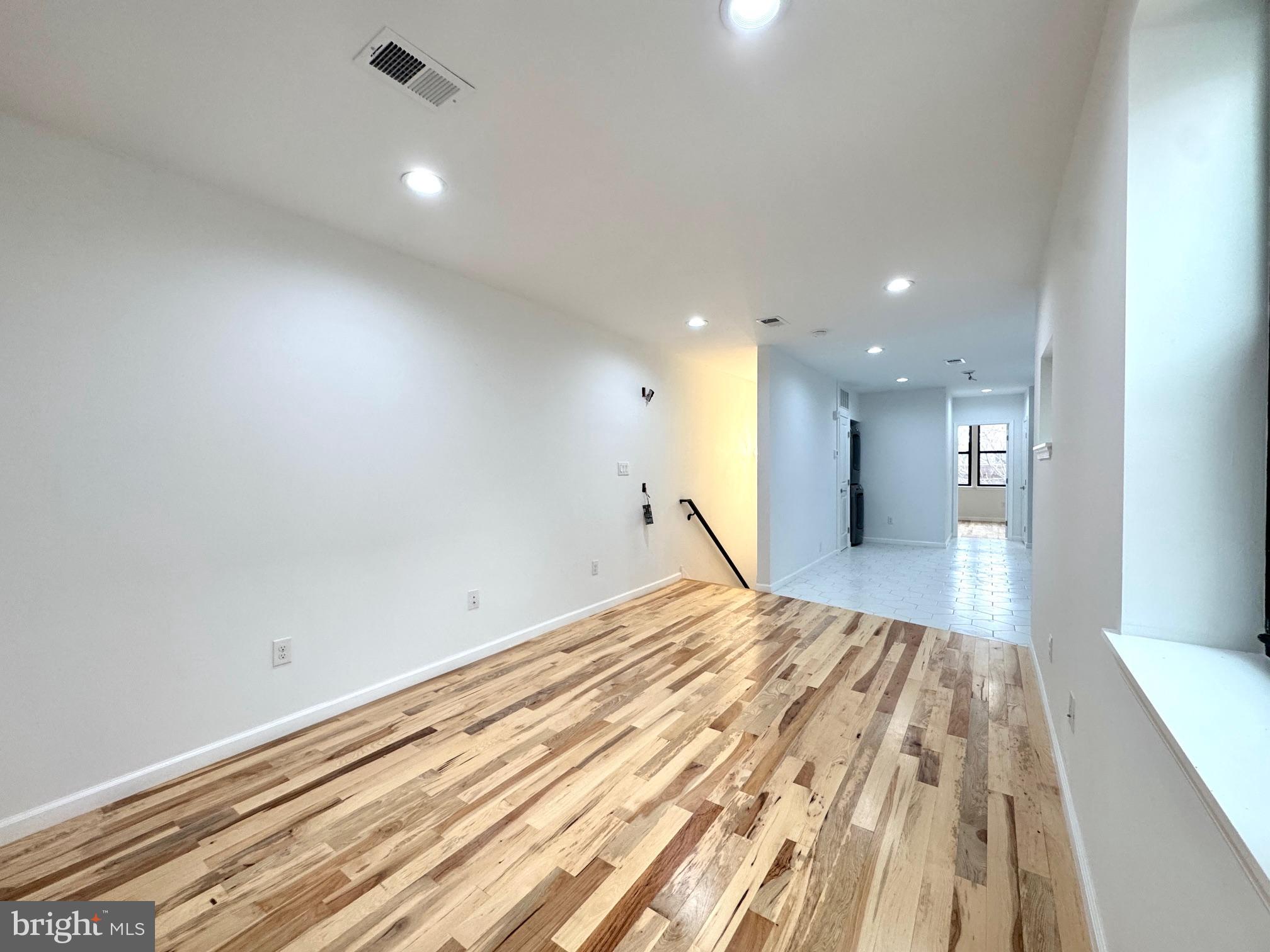 781 South 3rd Street, Unit 3 Philadelphia, PA 19147 - Photo 5 of 17 a view of empty room with wooden floor