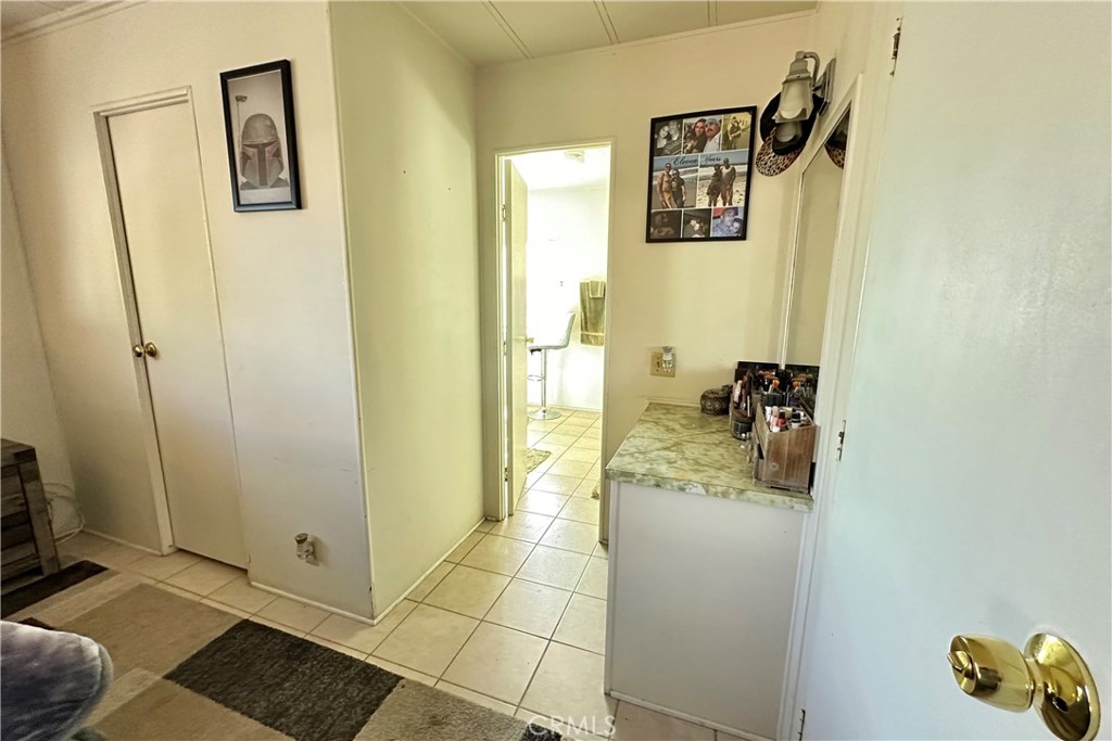 3745 Valley Boulevard, Unit 12 Walnut, CA 91789 - Photo 24 of 43 a bathroom with a sink and mirror