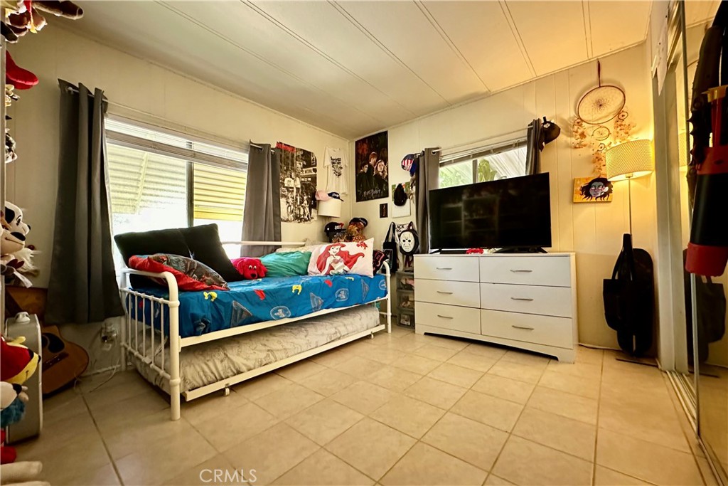 3745 Valley Boulevard, Unit 12 Walnut, CA 91789 - Photo 27 of 43 a view of living room with furniture and flat screen tv