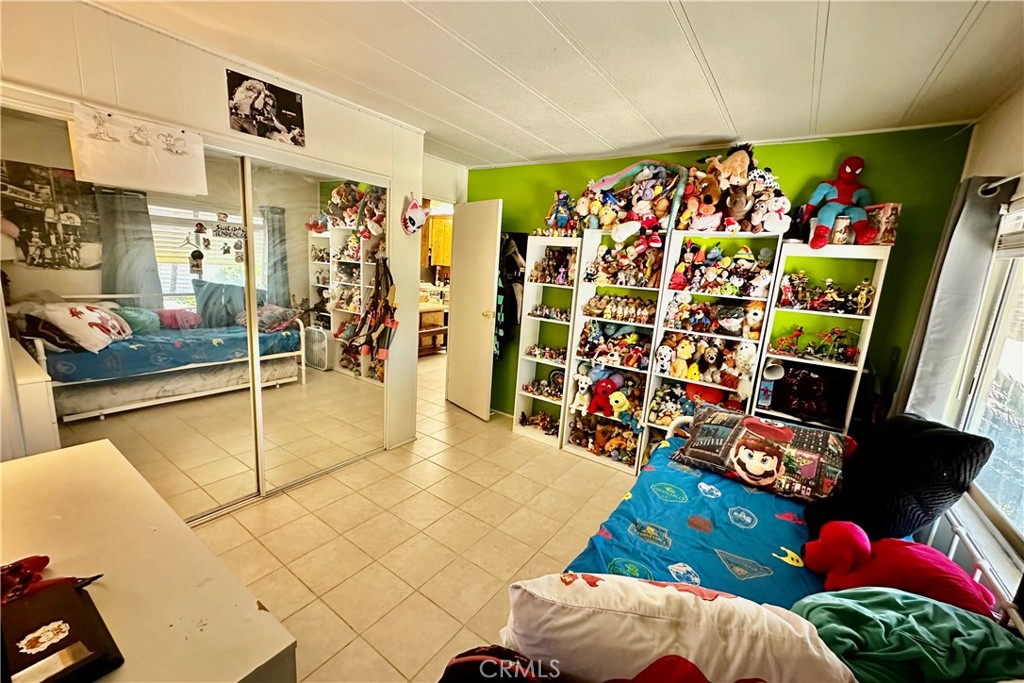 3745 Valley Boulevard, Unit 12 Walnut, CA 91789 - Photo 28 of 43 a view of a room with shelves