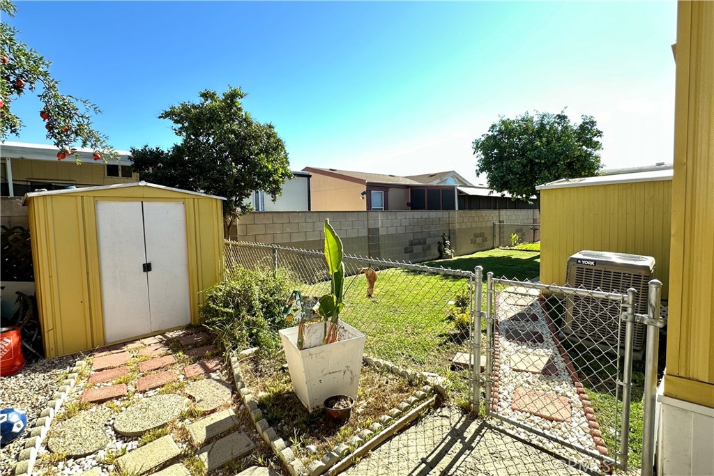 3745 Valley Boulevard, Unit 12 Walnut, CA 91789 - Photo 37 of 43 a view of an outdoor dining space with a table and chair