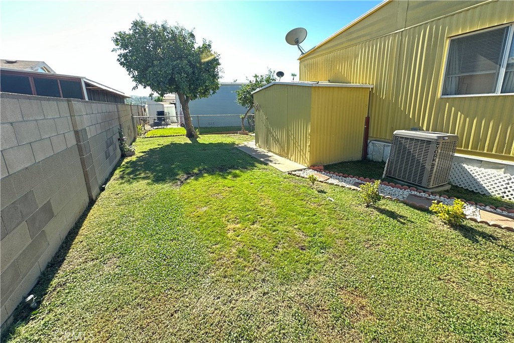 3745 Valley Boulevard, Unit 12 Walnut, CA 91789 - Photo 42 of 43 a backyard of a house with seating space