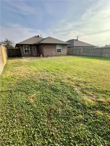 a view of a swimming pool and outdoor space