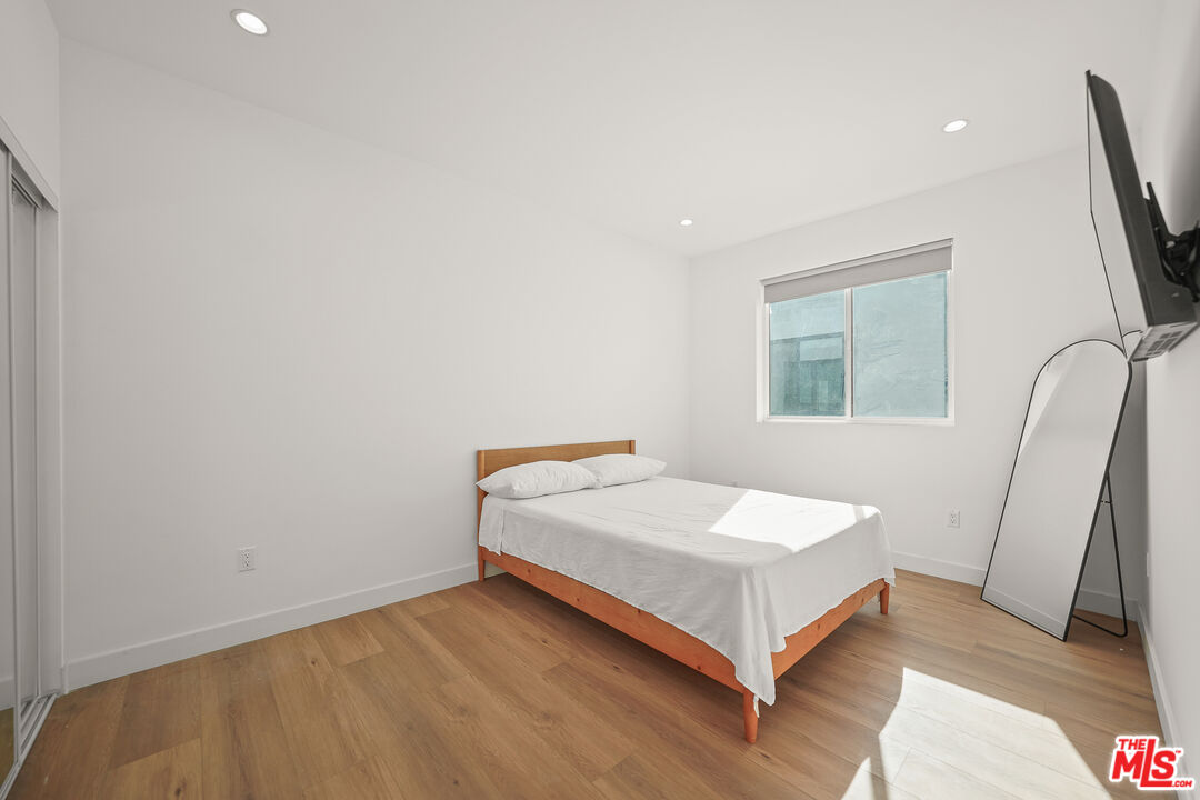 13692 Erwin Street, Unit A Van Nuys, CA 91401 - Photo 23 of 47 a room with a bed and a window