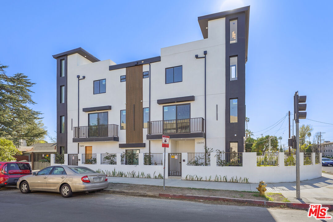 13692 Erwin Street, Unit A Van Nuys, CA 91401 - Photo 47 of 47 a view of a city street with a building