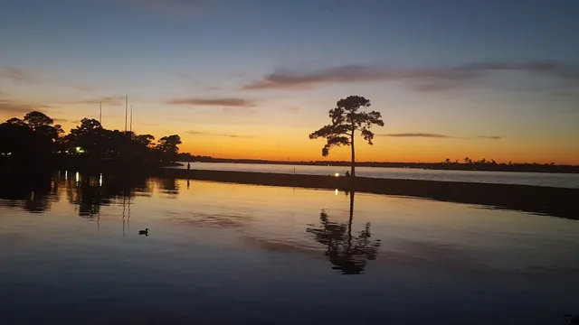 a view of ocean with boats