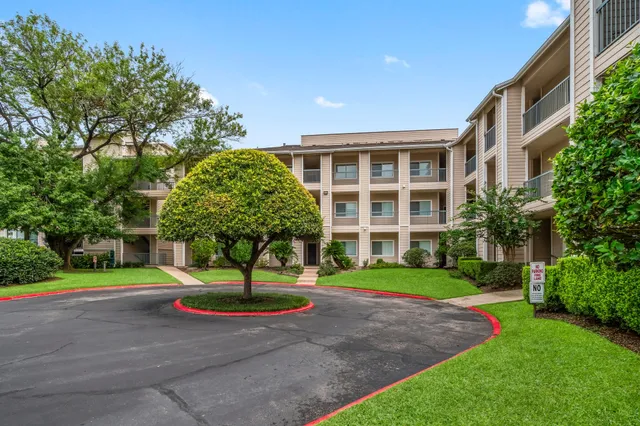 a house with garden in front of it
