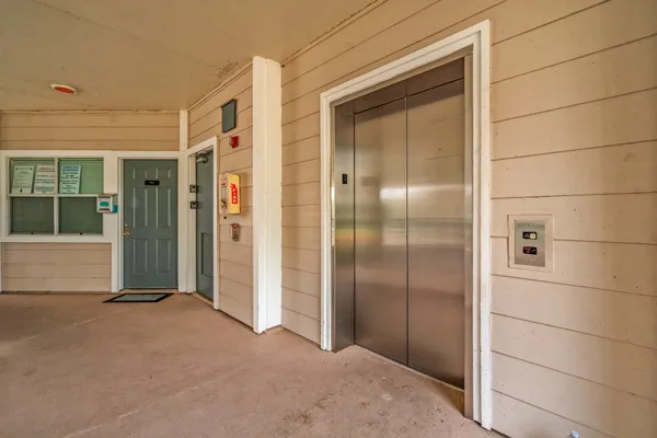 a view of a glass door of the house