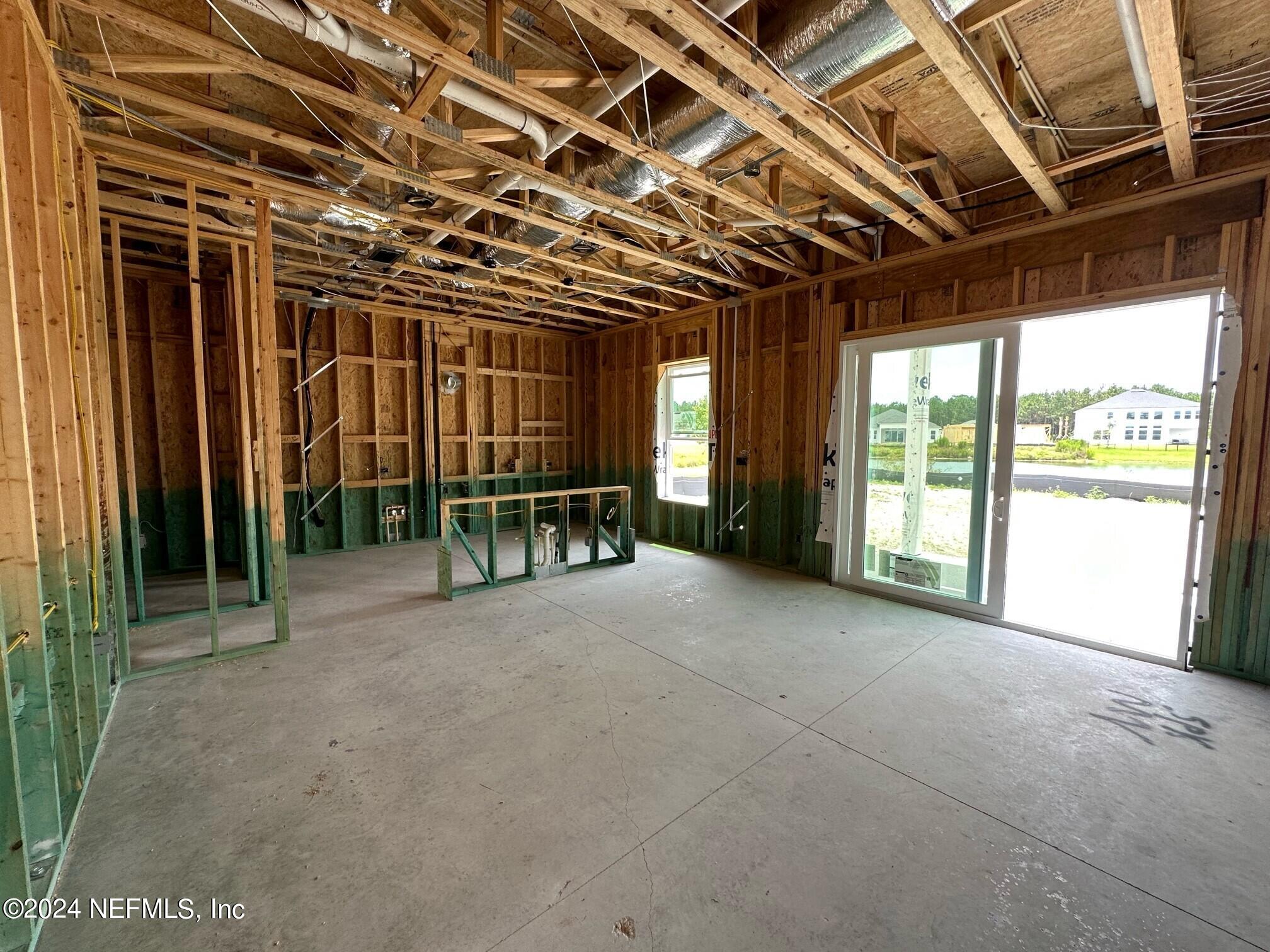 156 Iris Crk Drive St. Augustine, FL 32092 - Photo 4 of 33 a view of hall with wooden floor