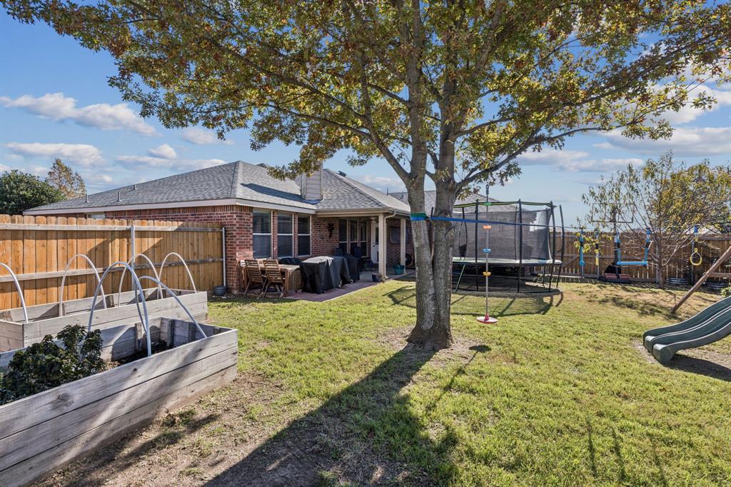 1421 Heather Ridge Drive Lancaster, TX 75146 - Photo 20 of 22 a view of a house with swimming pool and sitting area
