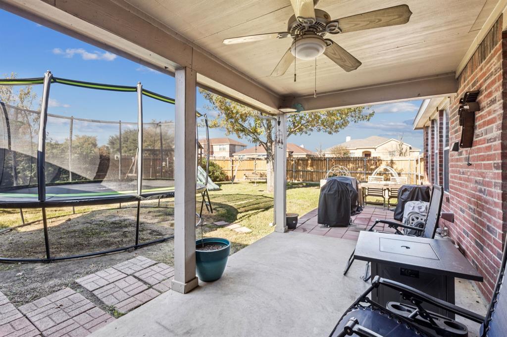 1421 Heather Ridge Drive Lancaster, TX 75146 - Photo 21 of 22 a room with furniture and large windows