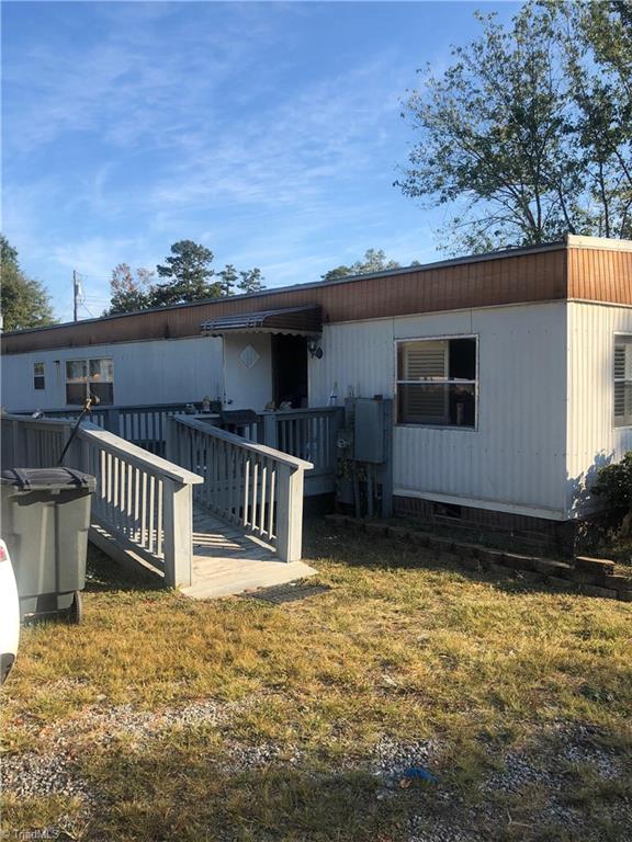 4044 Sawmill Road Winston-Salem, NC 27107 - Photo 2 of 4 Rear exterior from southwest side.