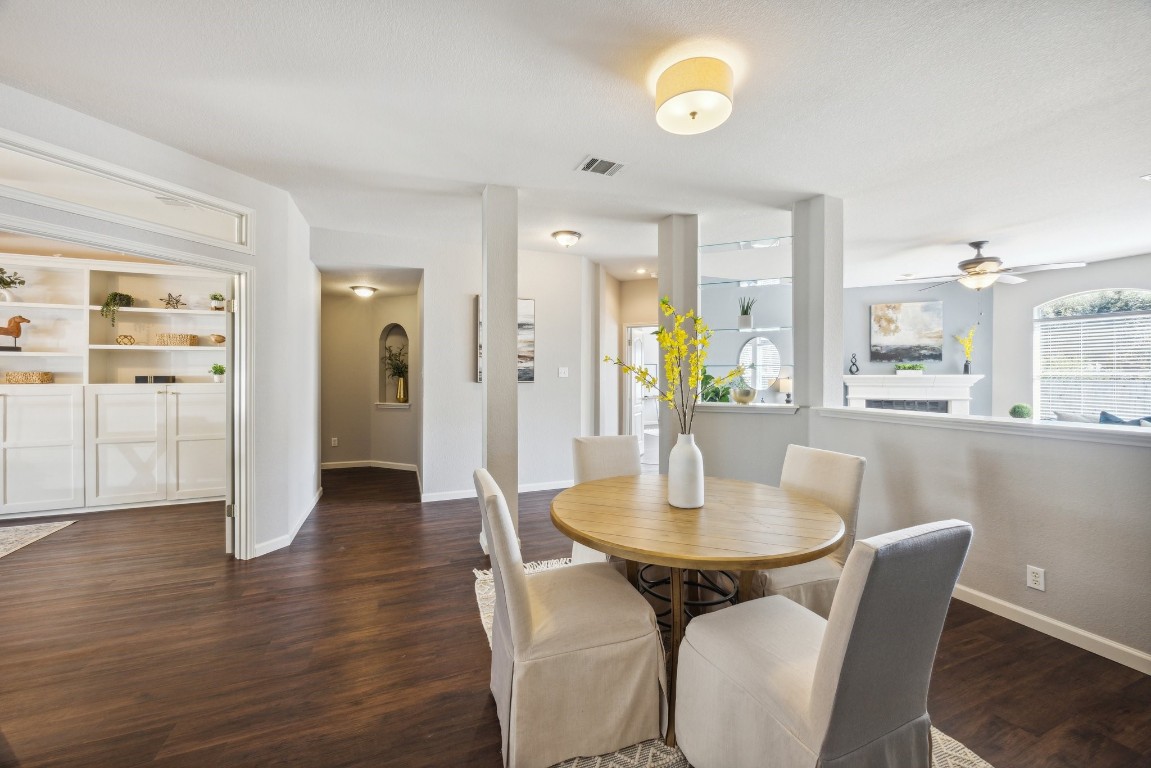 8909 Copano Drive Austin, TX 78749 - Photo 1 of 1 a view of a dining room with furniture and wooden floor