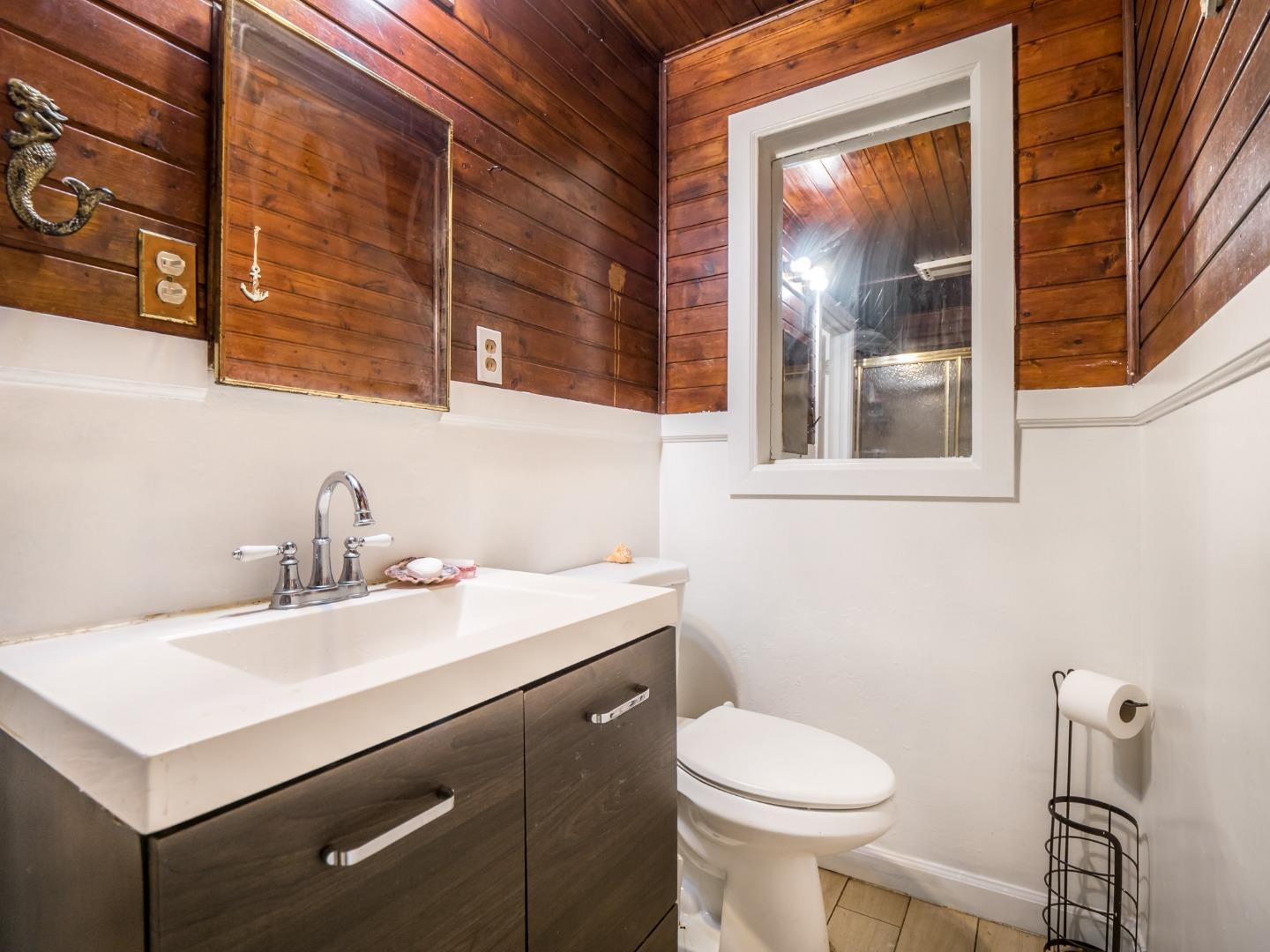 10970 Riverside Road Brookdale, CA 95005 - Photo 25 of 27 a bathroom with a sink toilet and mirror