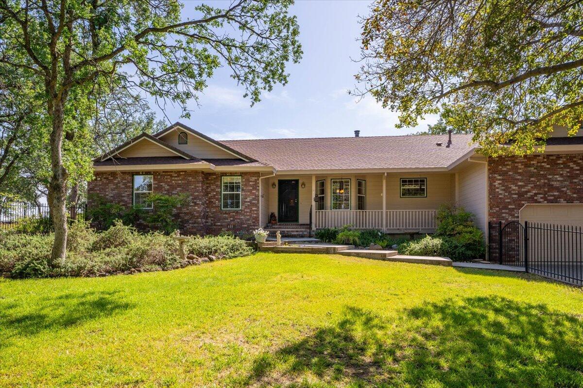 a front view of a house with swimming pool