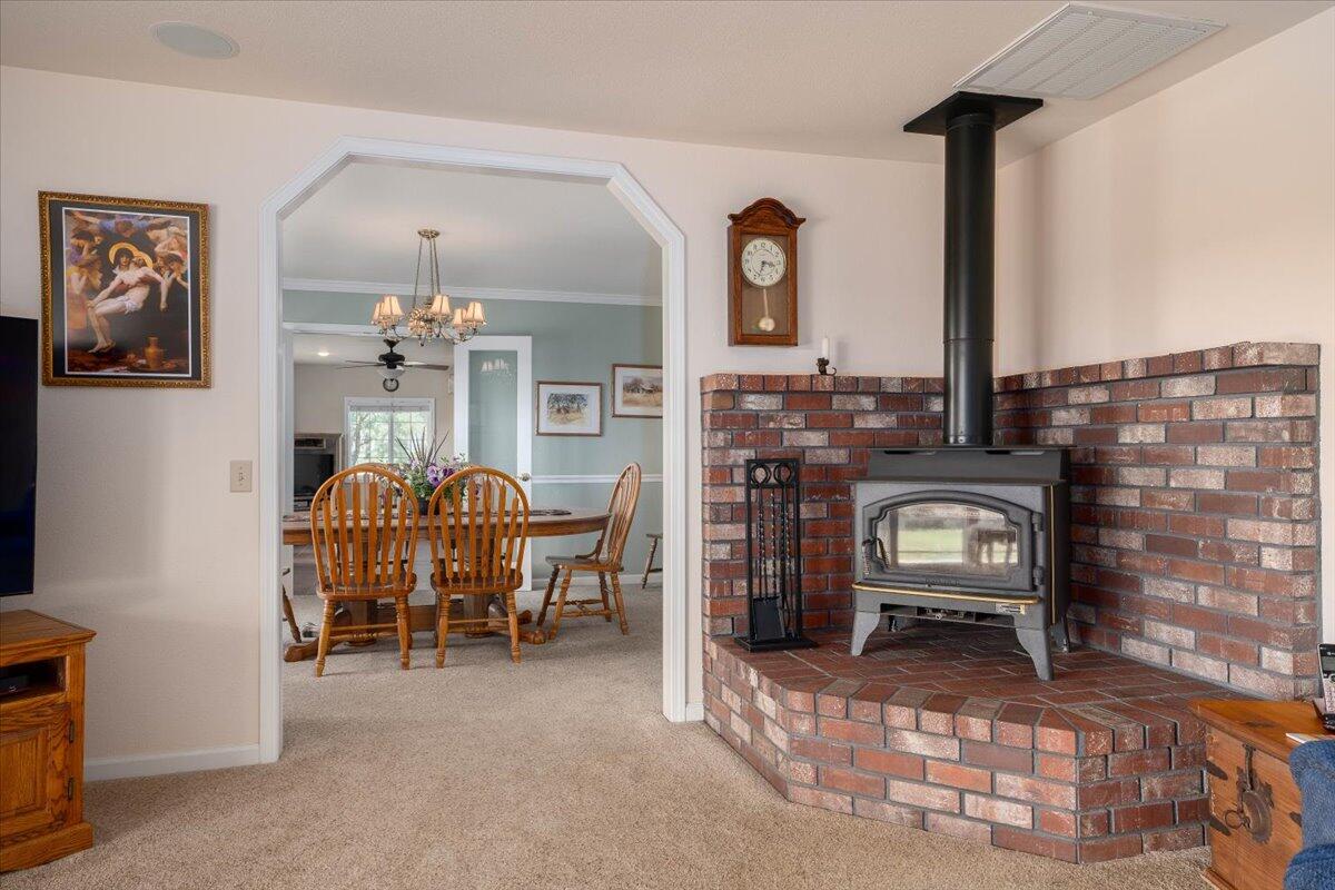 19035 Bonita Road Red Bluff, CA 96080 - Photo 16 of 55 a dining room with furniture and chandelier