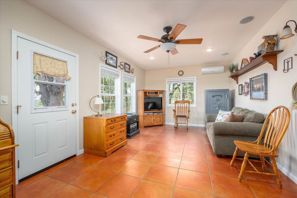 19035 Bonita Road Red Bluff, CA 96080 - Photo 20 of 55 a living room with furniture and a window