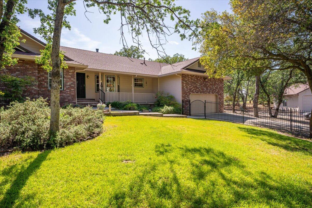 19035 Bonita Road Red Bluff, CA 96080 - Photo 2 of 55 a front view of house with swimming pool
