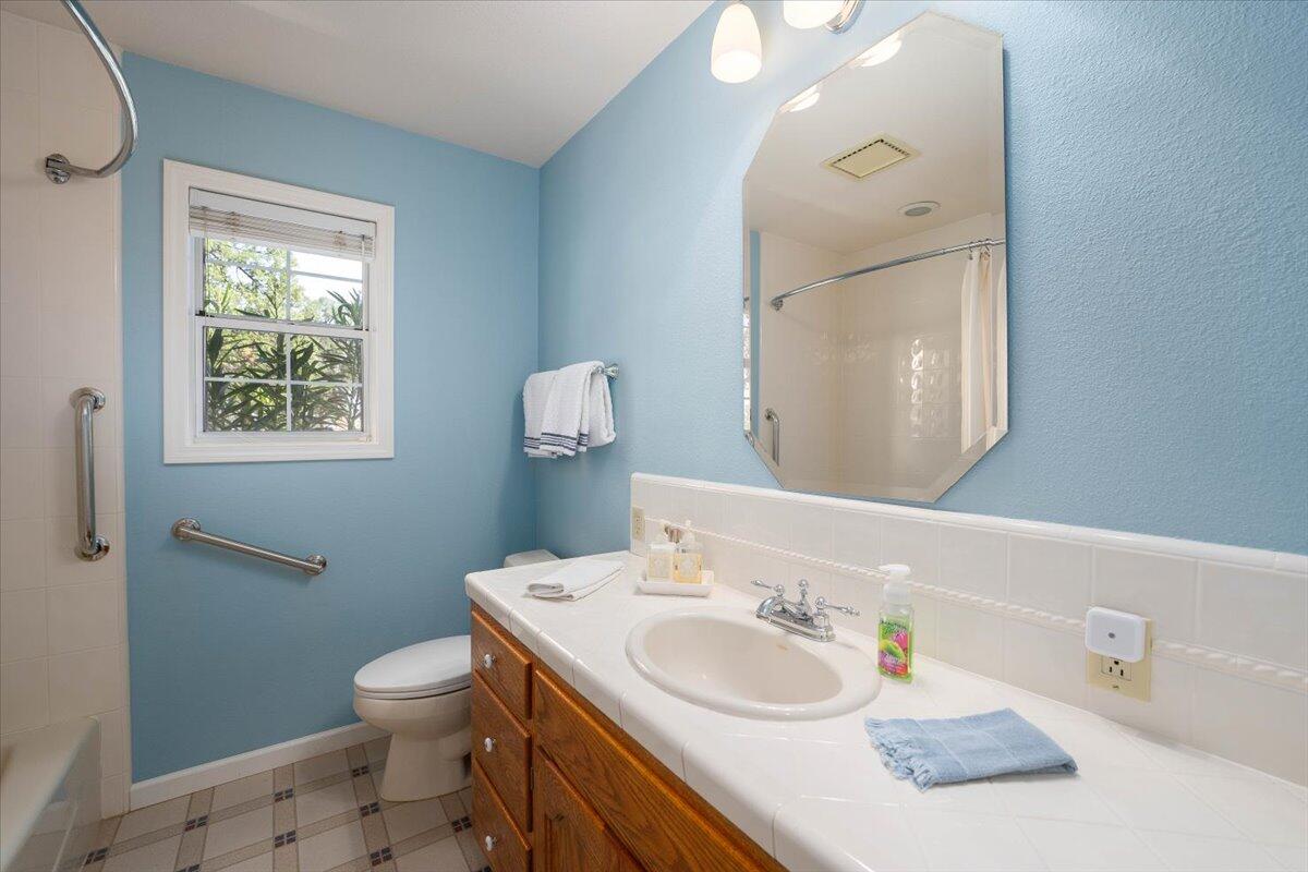 19035 Bonita Road Red Bluff, CA 96080 - Photo 29 of 55 a bathroom with a sink and a mirror
