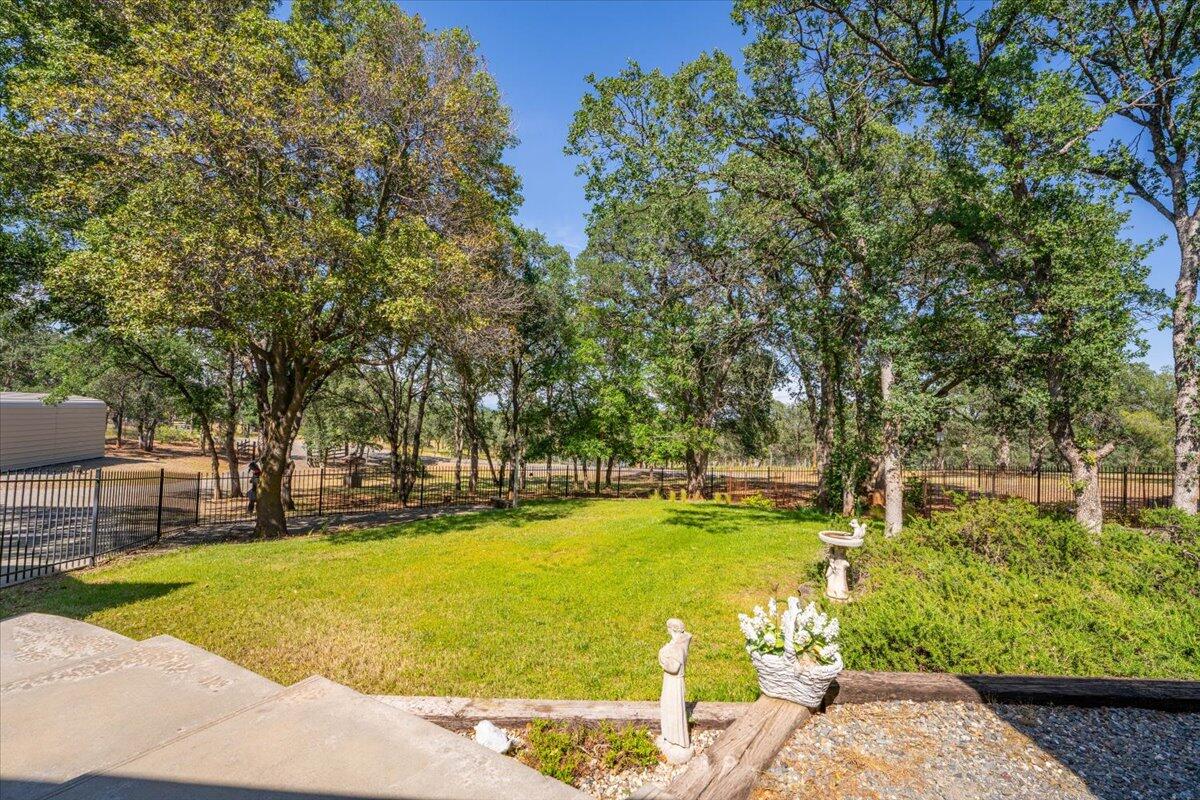 19035 Bonita Road Red Bluff, CA 96080 - Photo 7 of 55 a swimming pool with outdoor seating and yard