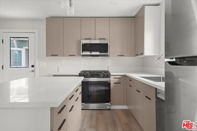 a view of room with window and ceiling fan