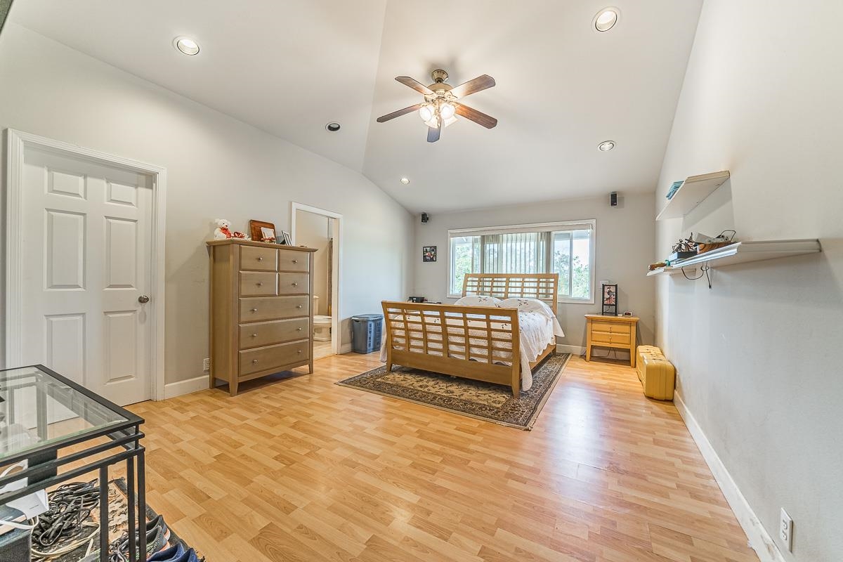 2640 Puuomalei Road Haiku, HI 96708 - Photo 11 of 30 a bedroom with a bed and window