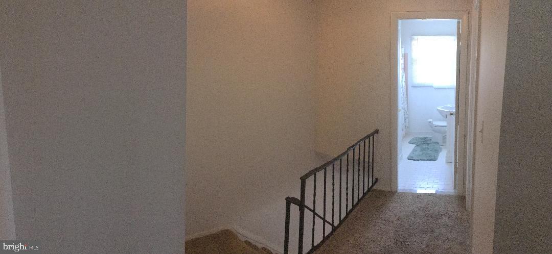 4391 Crest Heights Road Baltimore, MD 21215 - Photo 8 of 14 Upstairs Hallway