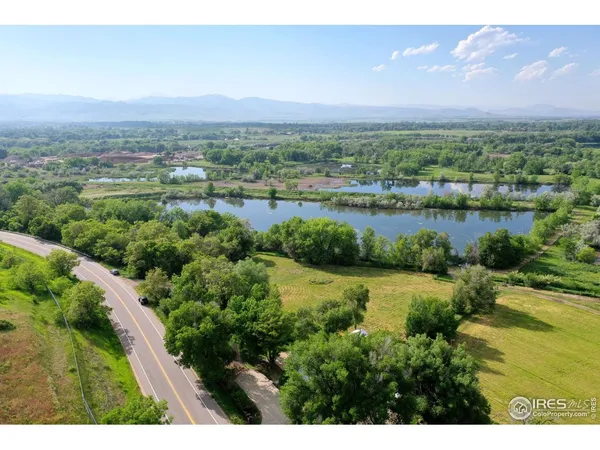a view of a city and mountains ocean view
