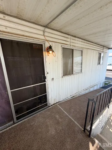 a view of outdoor space and car parked