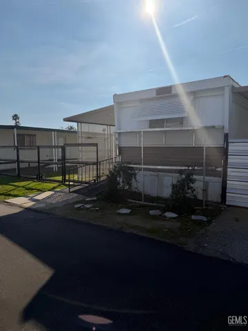 a stove top oven sitting inside of a kitchen