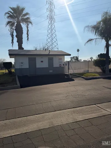 a view of a lake with outdoor seating and yard