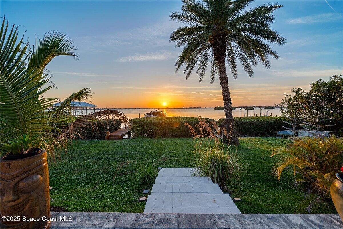 466 Lanternback Island Drive Satellite Beach, FL 32937 - Photo 101 of 117 a view of a backyard of a house