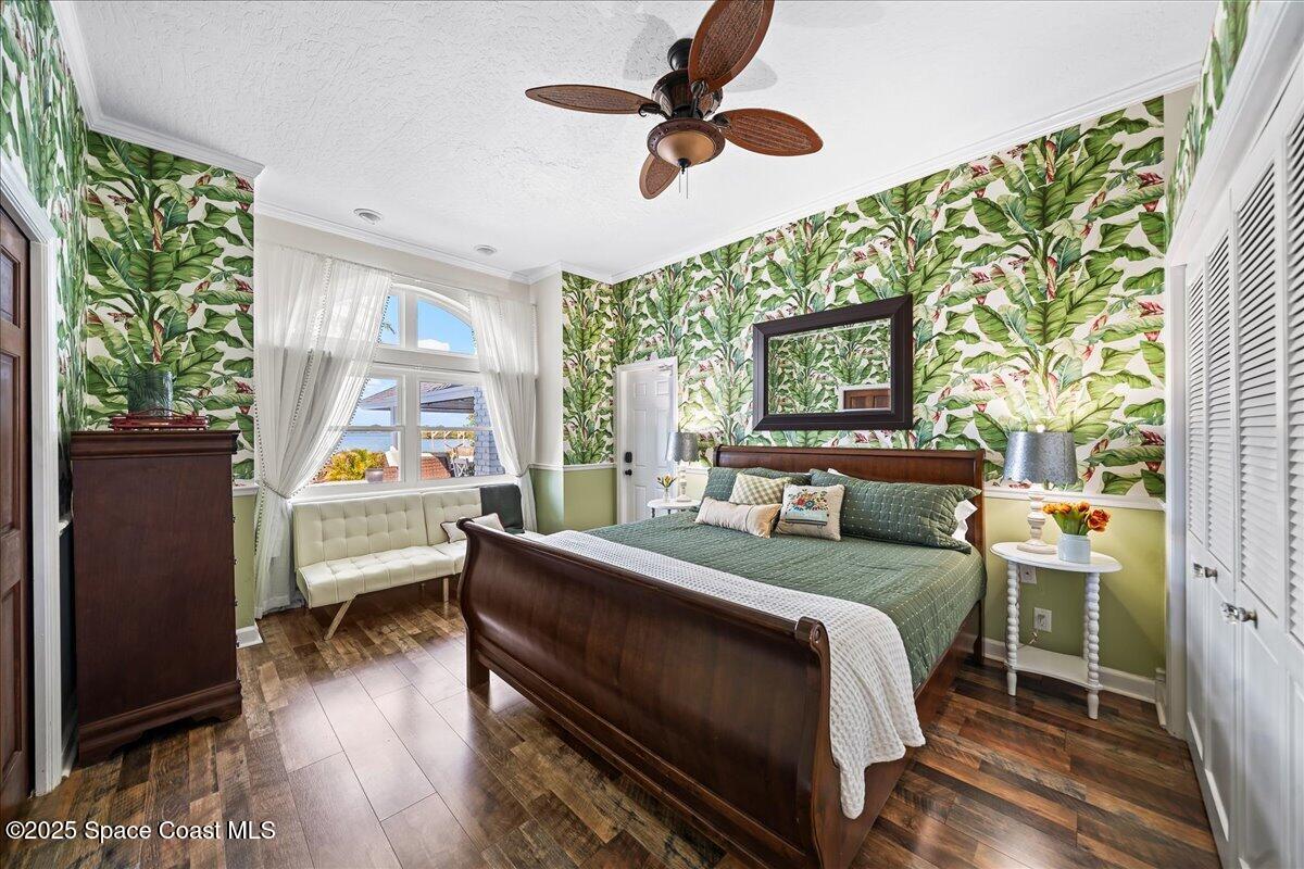 466 Lanternback Island Drive Satellite Beach, FL 32937 - Photo 26 of 117 a bedroom with a bed dresser and a window