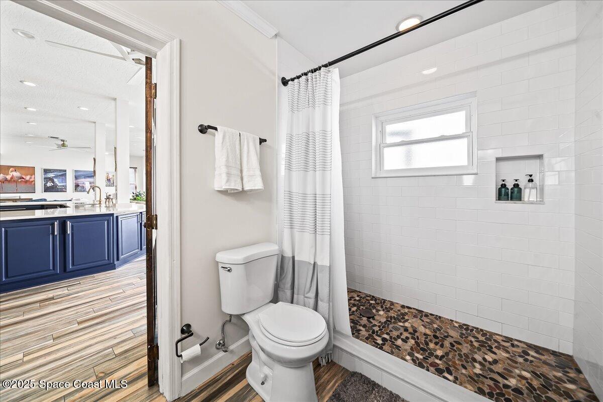 466 Lanternback Island Drive Satellite Beach, FL 32937 - Photo 29 of 117 a bathroom with a toilet and a shower