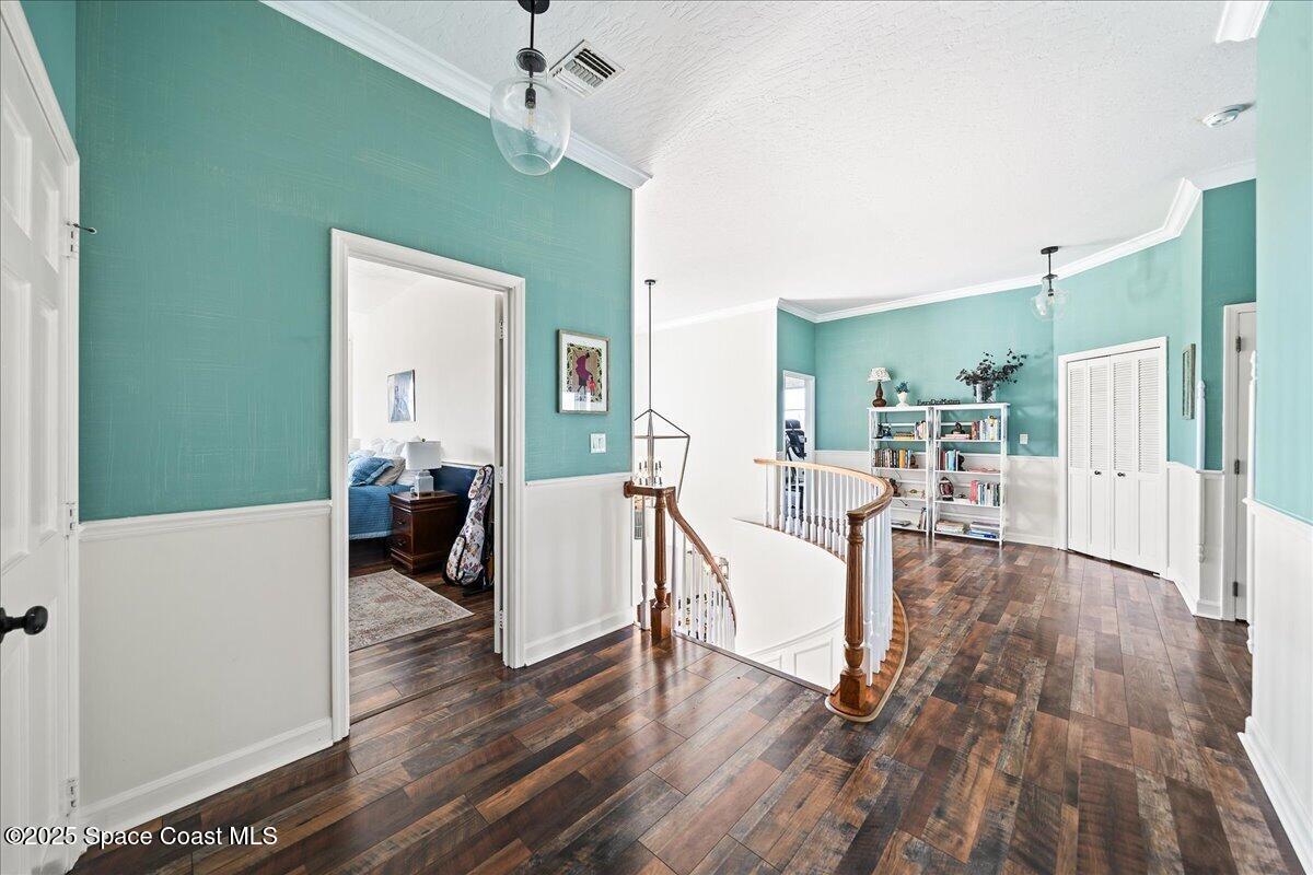 466 Lanternback Island Drive Satellite Beach, FL 32937 - Photo 30 of 117 a living room with furniture and a wooden floor