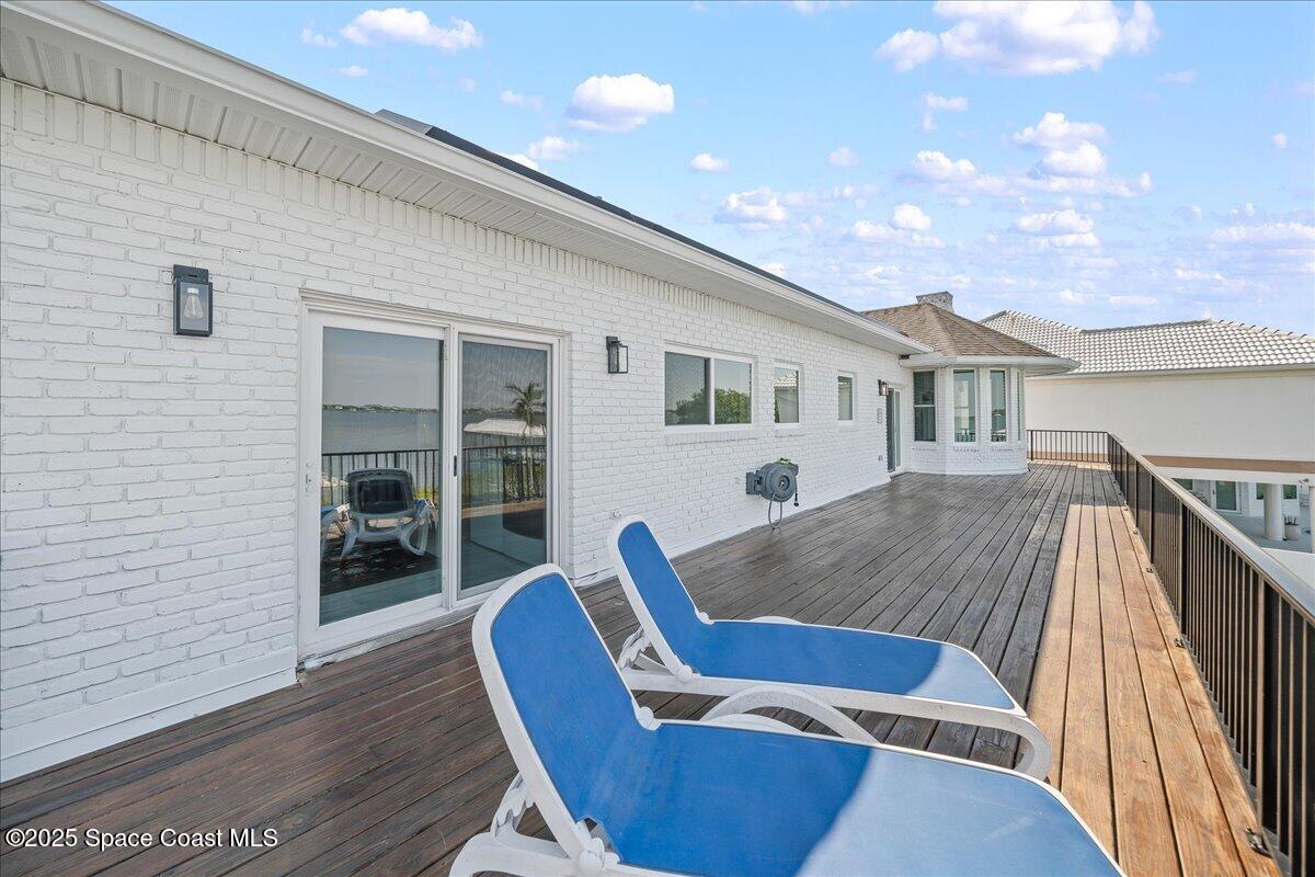 466 Lanternback Island Drive Satellite Beach, FL 32937 - Photo 41 of 117 a dinning room with furniture and wooden floor