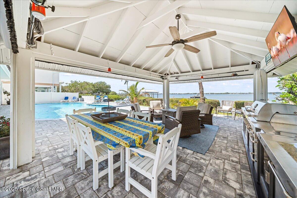 466 Lanternback Island Drive Satellite Beach, FL 32937 - Photo 62 of 117 a view of a dining room with furniture window and outside view