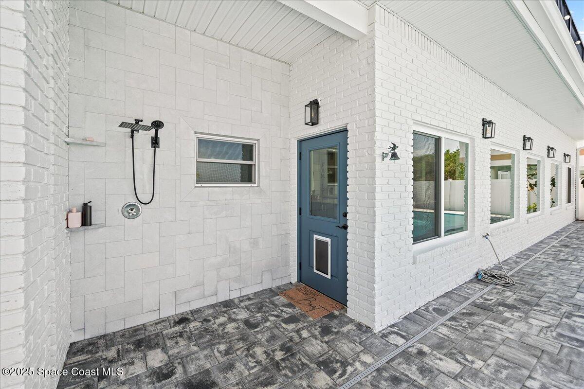 466 Lanternback Island Drive Satellite Beach, FL 32937 - Photo 70 of 117 a view of a bathroom with a shower