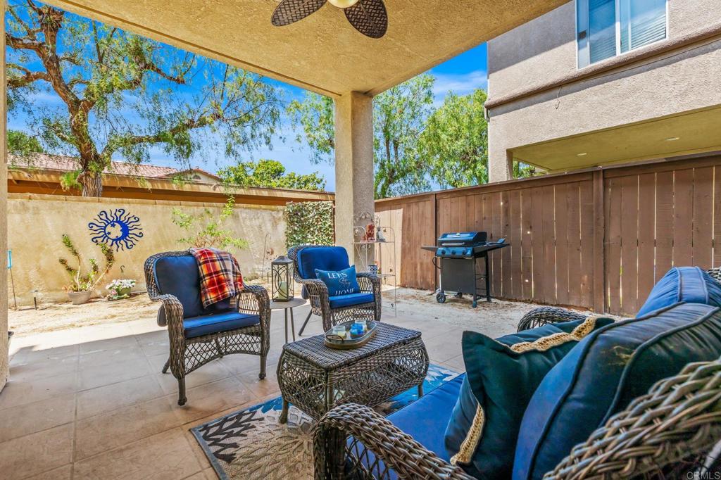 a outdoor living space with furniture and outdoor view
