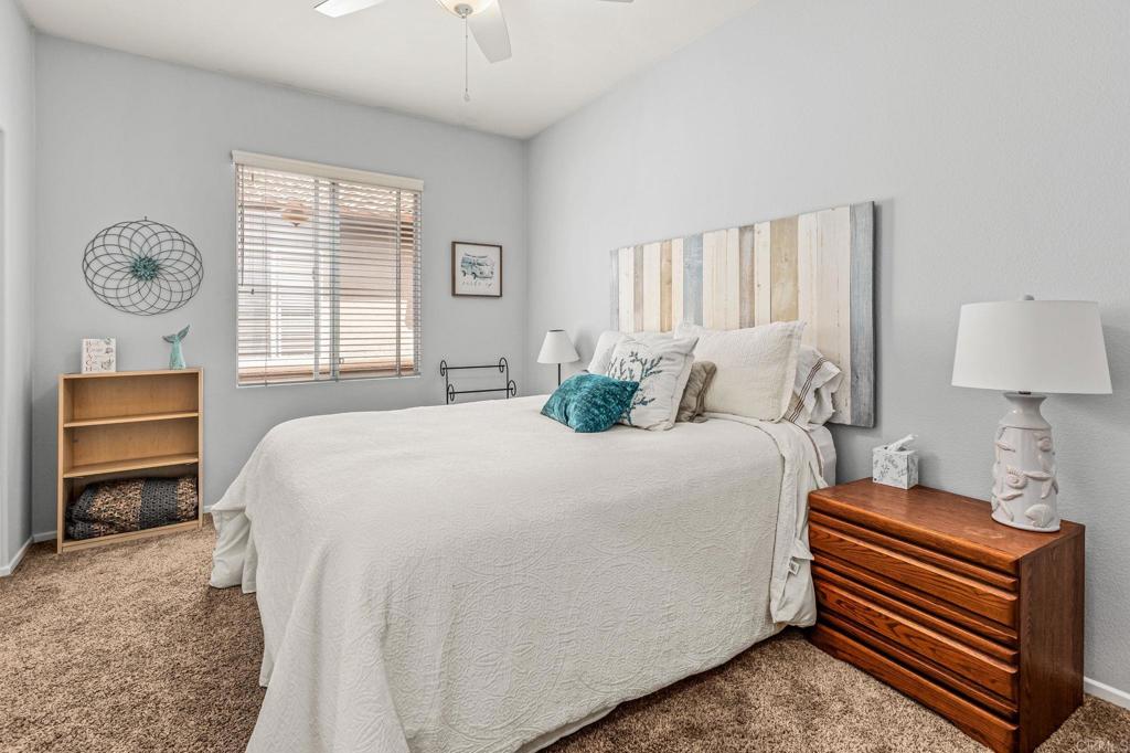 625 Sumner Way, Unit 2 Oceanside, CA 92058 - Photo 15 of 31 a bedroom with a bed and a window
