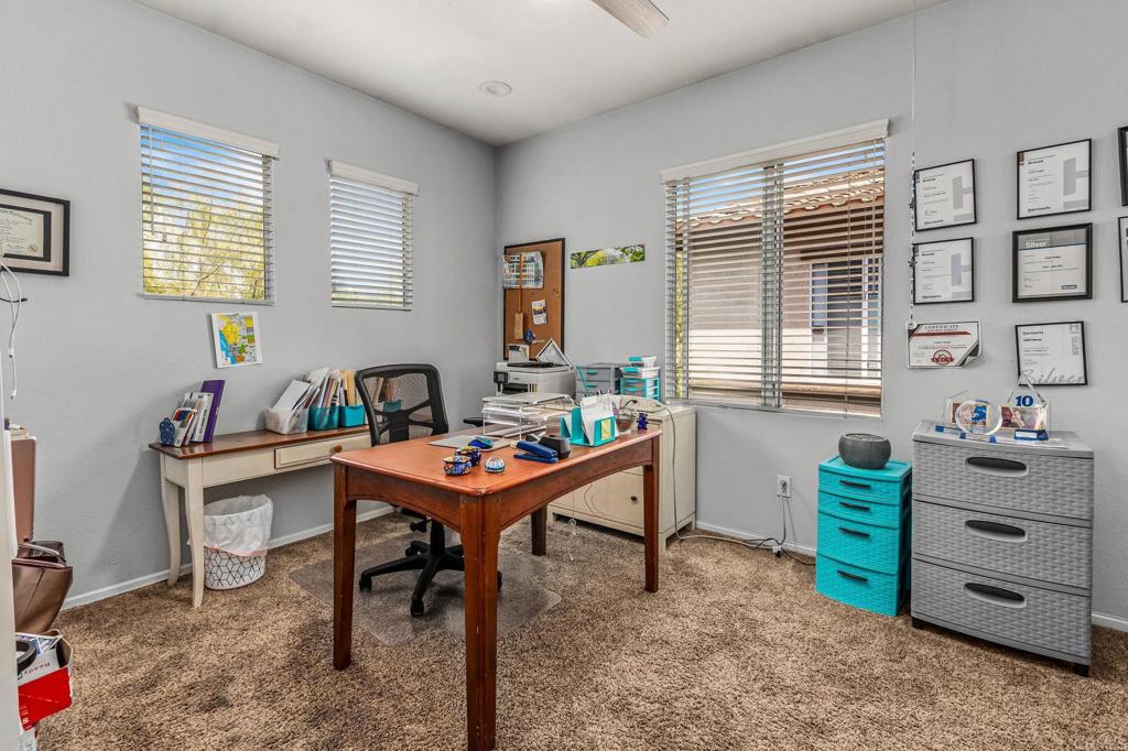 625 Sumner Way, Unit 2 Oceanside, CA 92058 - Photo 17 of 31 a living room with furniture and a window