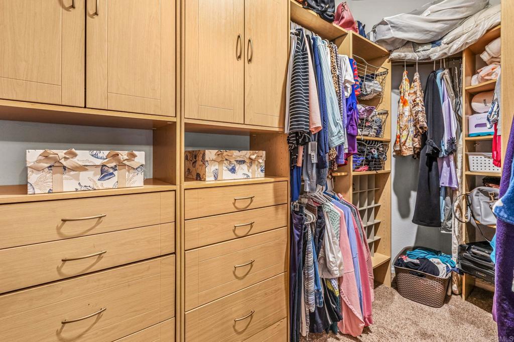 625 Sumner Way, Unit 2 Oceanside, CA 92058 - Photo 22 of 31 a view of walk in closet with clothes