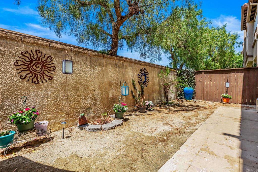 625 Sumner Way, Unit 2 Oceanside, CA 92058 - Photo 25 of 31 a view of a backyard