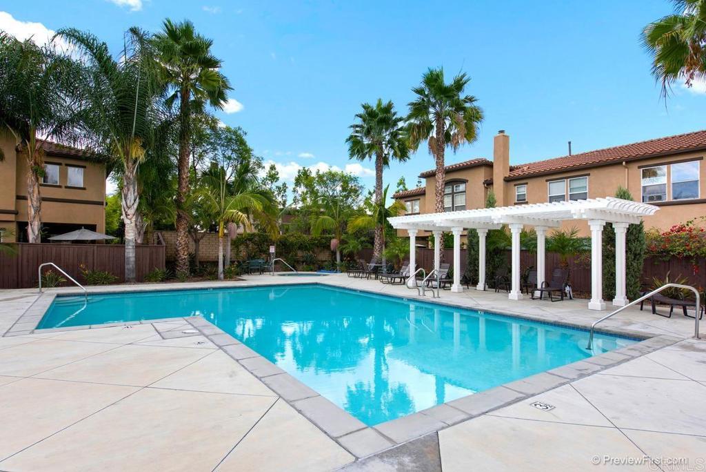 625 Sumner Way, Unit 2 Oceanside, CA 92058 - Photo 31 of 31 a view of a house with swimming pool