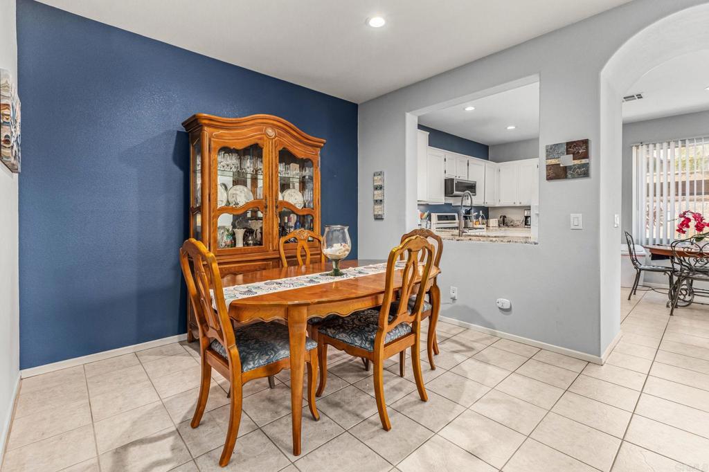 625 Sumner Way, Unit 2 Oceanside, CA 92058 - Photo 7 of 31 a view of a dining room with furniture