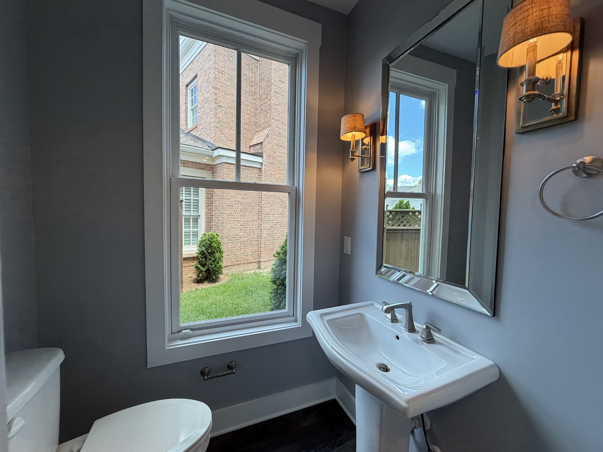 3097 Rural Plains Circle Franklin, TN 37064 - Photo 9 of 28 a bathroom with a toilet sink and mirror