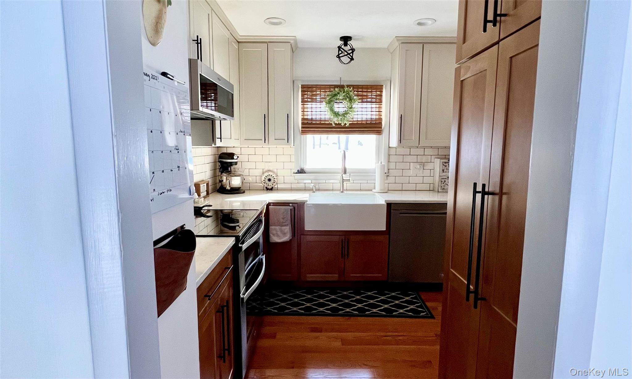 2 Garden Place Beacon, NY 12508 - Photo 18 of 33 a bathroom with a sink a mirror and shower