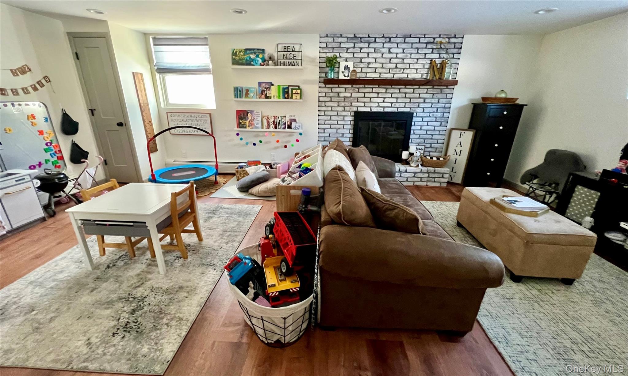 2 Garden Place Beacon, NY 12508 - Photo 29 of 33 a living room with furniture and a fireplace