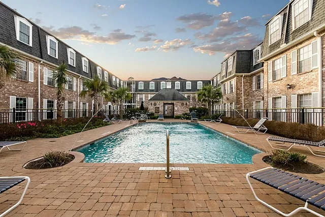 a view of a patio with a yard
